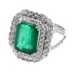 Impressive and large 18ct white gold emerald and diamond double halo ring with diamond set