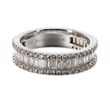 La Marquise 18ct white gold diamond 3/4 eternity ring, with a central band of baguette diamonds