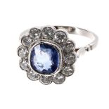 Fine platinum sapphire and diamond cluster ring, the sapphire 1.84 ct approx, in a surround of