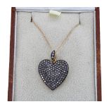 14ct diamond set heart-shaped pendant on a slender 9ct necklace, the pendant 26mm x 19.5mm, 3.