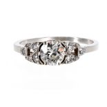 Attractive platinum diamond set ring, with central diamond 0.60ct approx, clarity SI, colour H/J, in