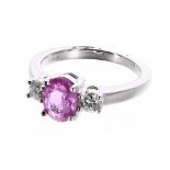 18ct white gold oval pink sapphire and diamond three stone ring, the sapphire 1.50ct approx, round