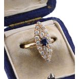 Attractive sapphire and diamond marquise shaped cluster ring, the oval sapphire 0.40ct approx, in