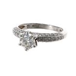 Platinum solitaire diamond ring with diamond shoulders, 0.70ct, 4.8gm, ring size M (fracture filled)
