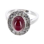 Good 18ct white gold diamond and ruby cabouchon oval cluster ring, the ruby 3.90ct approx, in a