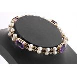 Amethyst and cultured pearl two row bracelet, set with four amethyst between pearl links, 11gm, 7.