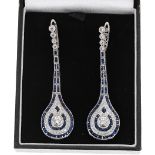 Pair of impressive white gold sapphire and diamond drop earrings in the Art Deco style, total