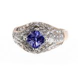 Attractive tanzanite and diamond cluster ring, 0.50ct princess-cut tanzanite of good colour,