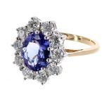 Good large 18ct tanzanite and diamond oval cluster ring, the tanzanite 2.46ct approx, in a