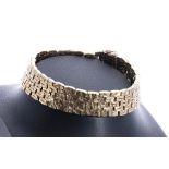 9ct yellow gold textured bracelet, London 1969, width 13mm, 40.4gm, 7.25" long