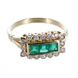 18ct emerald and diamond oblong cluster ring, with three princess-cut emeralds in a surround of