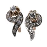 Pair of 14ct bicolour diamond earrings, round brilliant-cut, the principle diamonds in each 0.