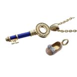 Theo Fennell 18ct and enamel key pendant on a curb chain, the pendant 58mm, the chain 17" long;