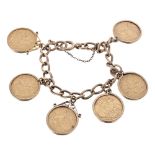 9ct curb link bracelet set with six full sovereigns, 1927, 1900, 1912, 1907, 1963, 1915, 74.7gm (