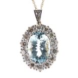 Good 18ct aquamarine and diamond oval pendant, the aquamarine 5.80ct, in a white metal setting of