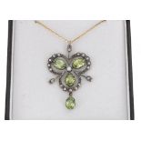 Pretty antique style peridot, diamond and seed pearl pendant, on a slender 9ct yellow gold necklace,