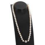 Very good quality cultured pearl and diamond necklace, the pearls each matching in colour and of