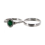 Platinum emerald and diamond cluster ring, cluster 9mm x 7mm, 5gm, ring size K/L; together with a