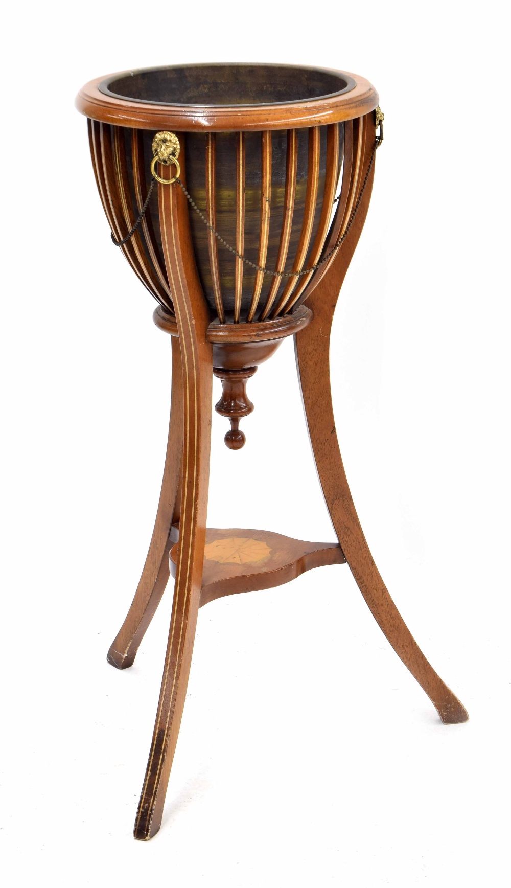 Edwardian inlaid mahogany jardiniere, brass lion head mounts to the bowl, on swept tripod support