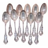 Ten Lincoln & Foss sterling dessert spoons, with scrolling pattern handles, presentation monogrammed