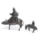 Japanese Meiji period bronze koro and cover, modelled as a gentleman riding a bull, 6" high;