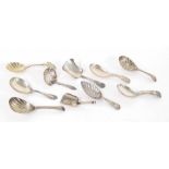 Collection of Georgian and later silver caddy spoons, some with scalloped bowls, 2.7oz t; also a