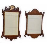 Georgian walnut fretwork wall mirror, inset with a rectangular bevelled plate within a gilt slip and