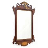 Georgian style fretwork wall mirror, the bevelled glass within mahogany frame surmounted by parcel