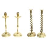 Pair of Victorian open barley twist brass candlesticks, 13.75" high; together with a pair of brass