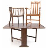 Oak gateleg breakfast table, 153" long, 36" deep, 30" high; together with an oak armchair with