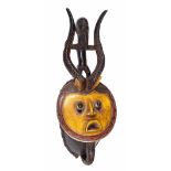 Interesting 20th century Baule (Ivory Coast) Lunar mask, polychrome decorated with yellow face
