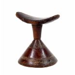 Ethiopian Kaffa tribal carved neck rest, upon a turned conical support, 6" high