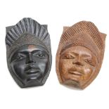 West African, Benin - carved ebony wall mask, 14.5" high; together with a companion carved coconut