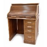 Early 20th century oak roll top single pedestal desk, 35.5" wide, 27" deep, 47" high