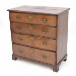 Georgian oak chest of drawers, the moulded top over four graduated drawers, with brass handles and