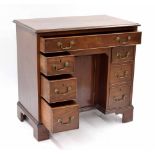 Small Georgian mahogany kneehole lady's desk, the moulded top over a single drawer over the recessed