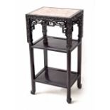 Chinese hardwood jardiniere stand, with inset marble top with carved fret frieze and supports over