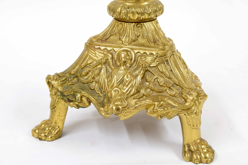 Antique brass ecclesiastical candlestick, raised on a trefoil base with repousse panels of a - Image 2 of 4