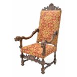 Good antique carved open armchair, with a carved crested back and carved mythical arm terminals over