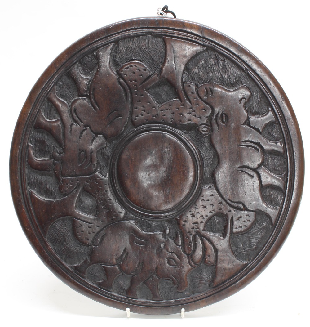 East African, Kenya - carved hardwood rhinoceros pattern plaque, with band of rhinoceros' and - Image 2 of 3