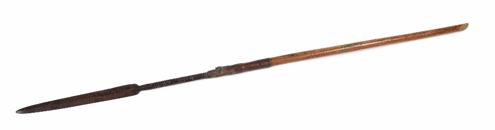 Late 19th century South African Zulu spear, the 13" long slender double edge tip with threaded screw