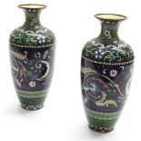 Pair of Japanese cloisonne baluster vases, decorated with bands of foliate motif within multiple