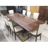 Good Art Deco rosewood rectangular extending dining table and eight chairs, with two further leaves,