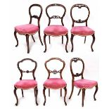 Harlequin set of six Victorian balloon back dining chairs, each with carved open back over stuffover