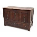 Antique oak coffer, the moulded hinged top over three panel front with later applied Art Nouveau