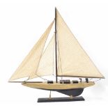 Vintage model of a pond yacht, mounted on a rectangular stand, 30" long, 29" high