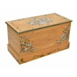 20th century floral painted pine blanket chest, the moulded hinged lid and front with Dutch style