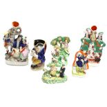 Five Staffordshire flatback figural groups and scenes, tallest 'The Rival' measures 12.5" high;