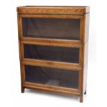 Oak three section stacking modular glazed bookcase in the Globe Wernicke style, 34" wide, 11"