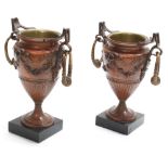 Pair of Classical style French bronze urns, with twin handles, brass liners, cast with floral
